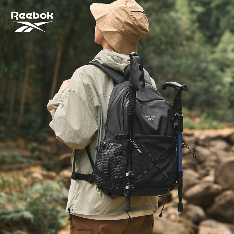 Outdoor Adventure Trips - กระเป๋าเป้สะพายหลัง REEBOK อเนกประสงค์สำหรับการเดินทางและตั้งแคมป์กลางแจ้ง กันน้ำ เหมาะสำหรับผู้ชายและผู้หญิง ใช้สำหรับเดินป่าและมีหลายช่องเก็บของ